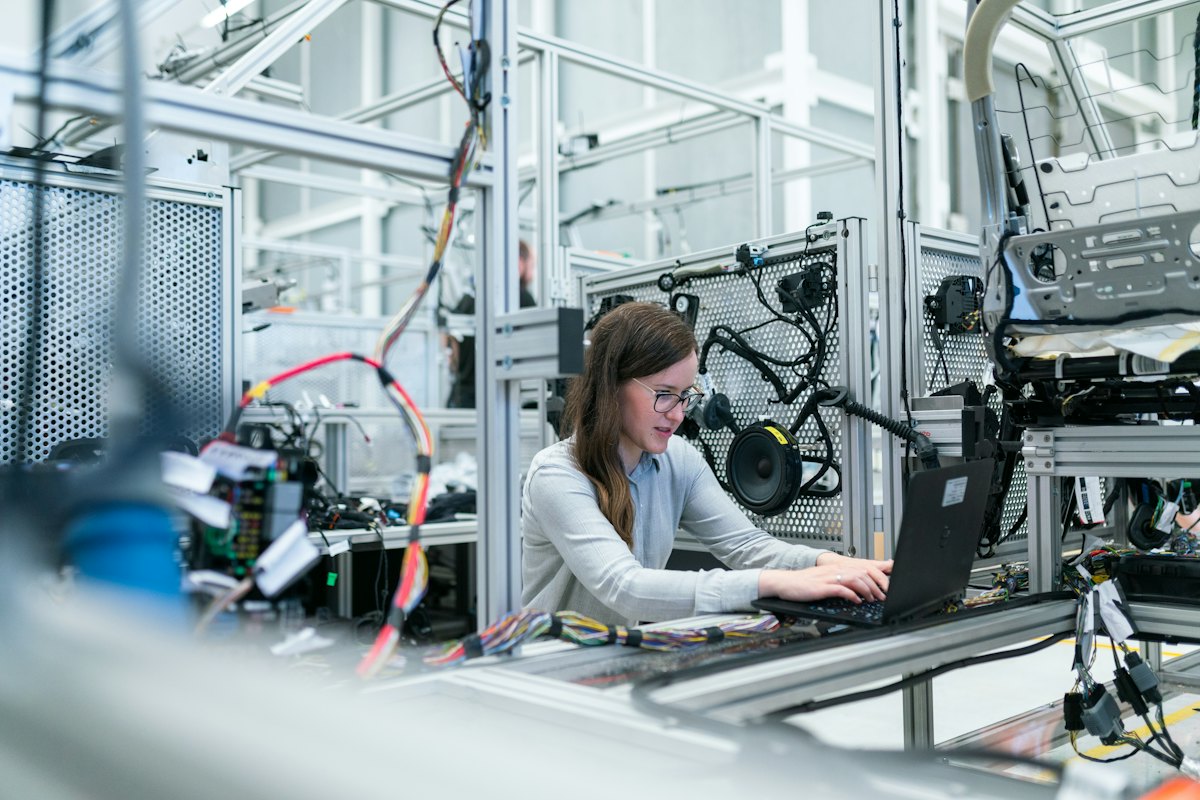 Engineer working at an industrial production line