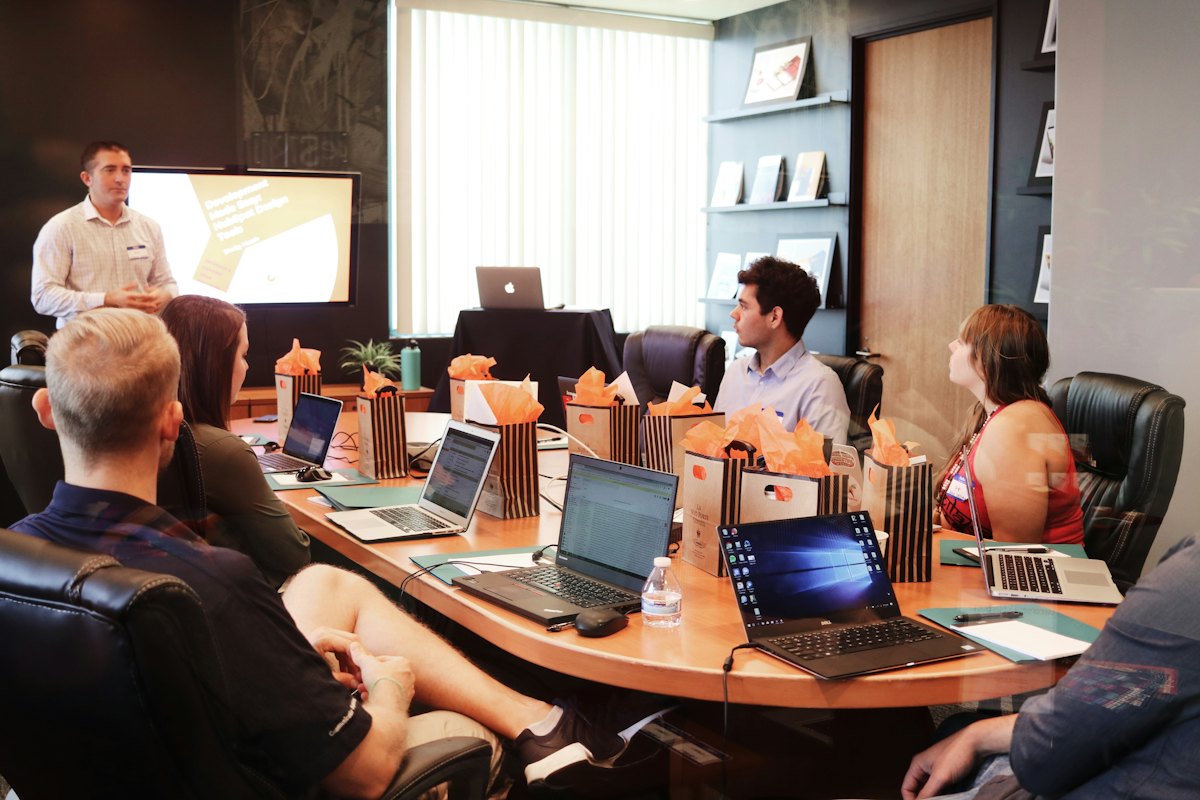CoreTech consultants presenting to a client team