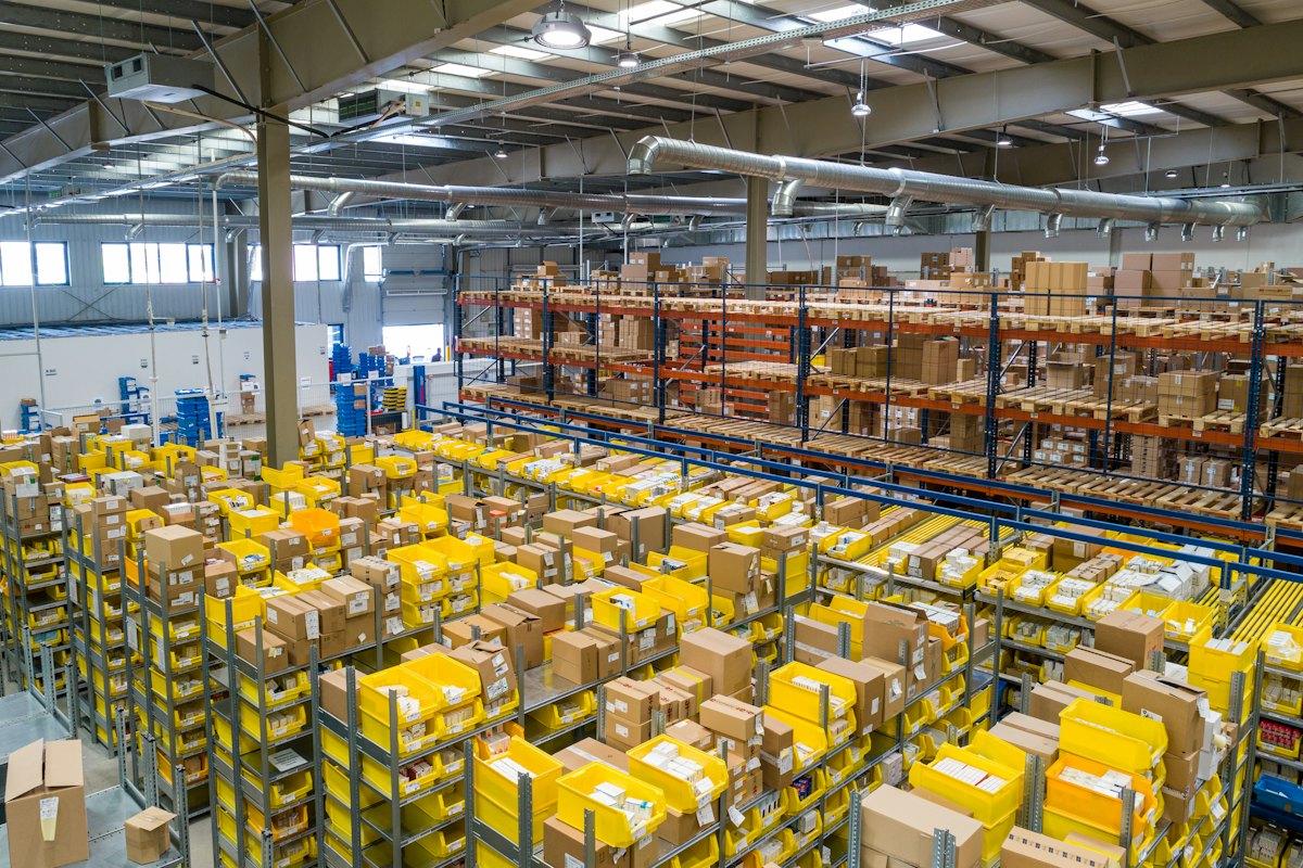 Large distribution warehouse with stocked shelving